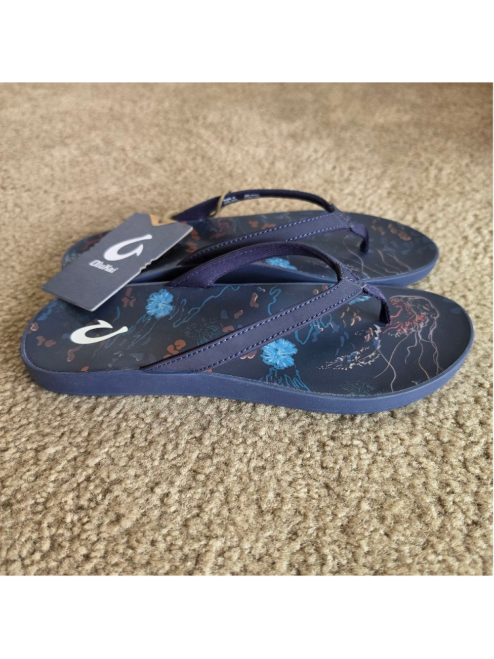 OluKai Pauwe Navy Floral Jellyfish Print Flip Flop Sandals - Picture 3 of 6